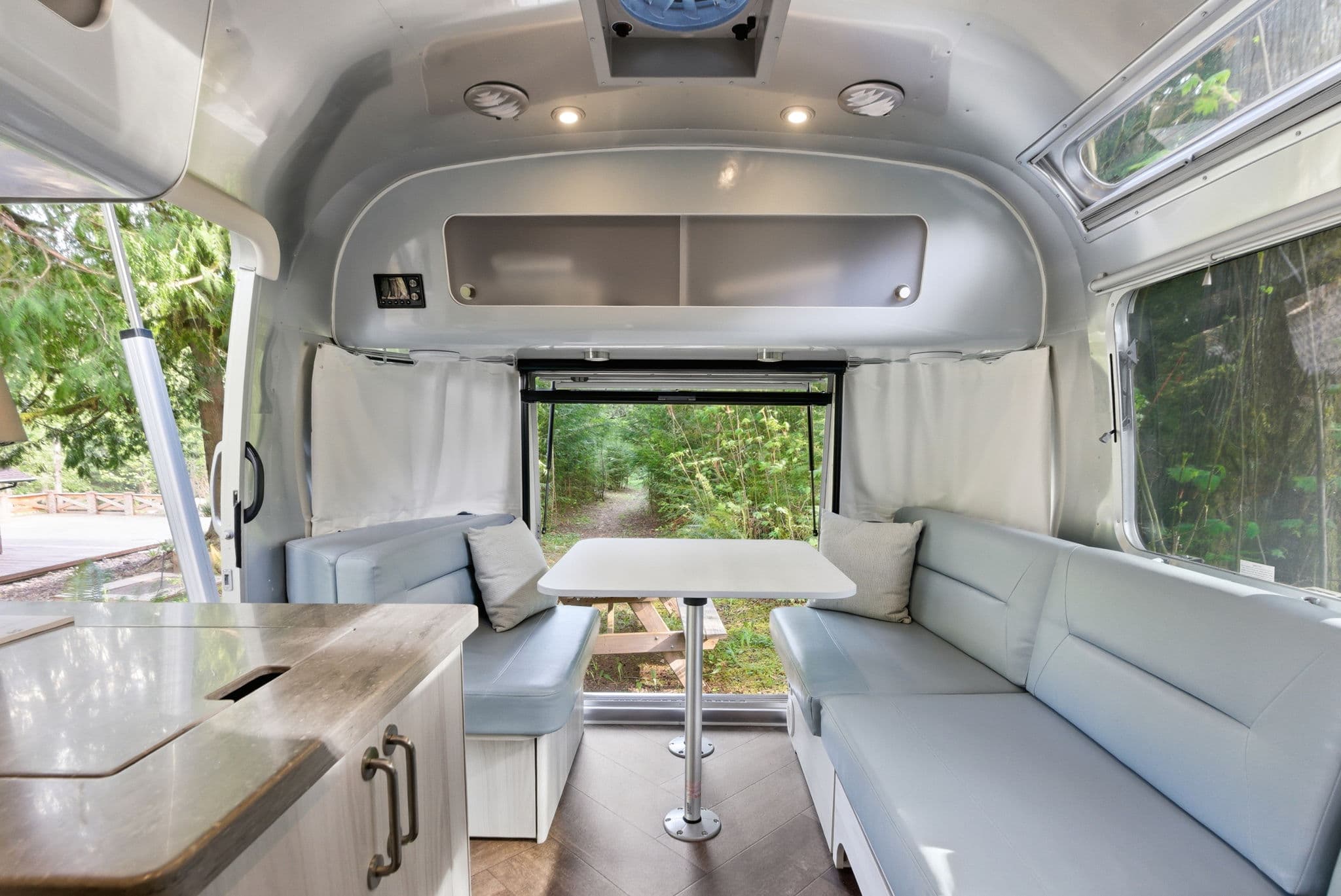 Wide view of the Airstream lounge and dining area