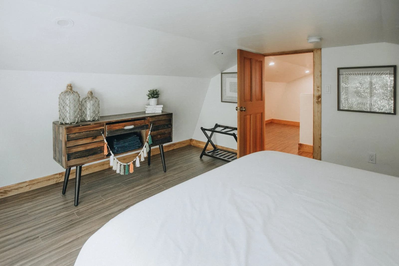 Loft bedroom with cowhide pillows