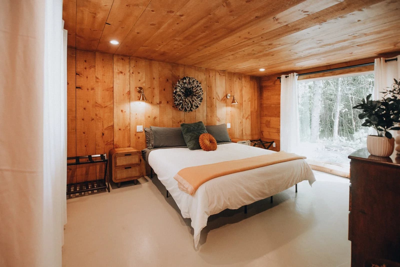 Master bedroom with forest window